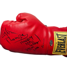 Pinklon Thomas Heavyweight Champion Authentic Signed Boxing Glove inscribed 'Happy New Year'