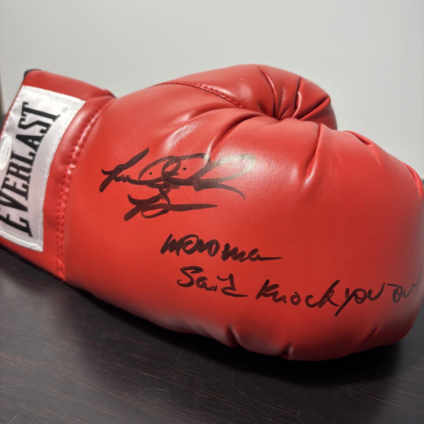 Riddick Bowe World Heavyweight Champion Authentic Signed Boxing Glove inscribed 'Momma said knock you out'